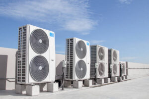 Air conditioning (HVAC) installed on the roof of industrial buildings.
